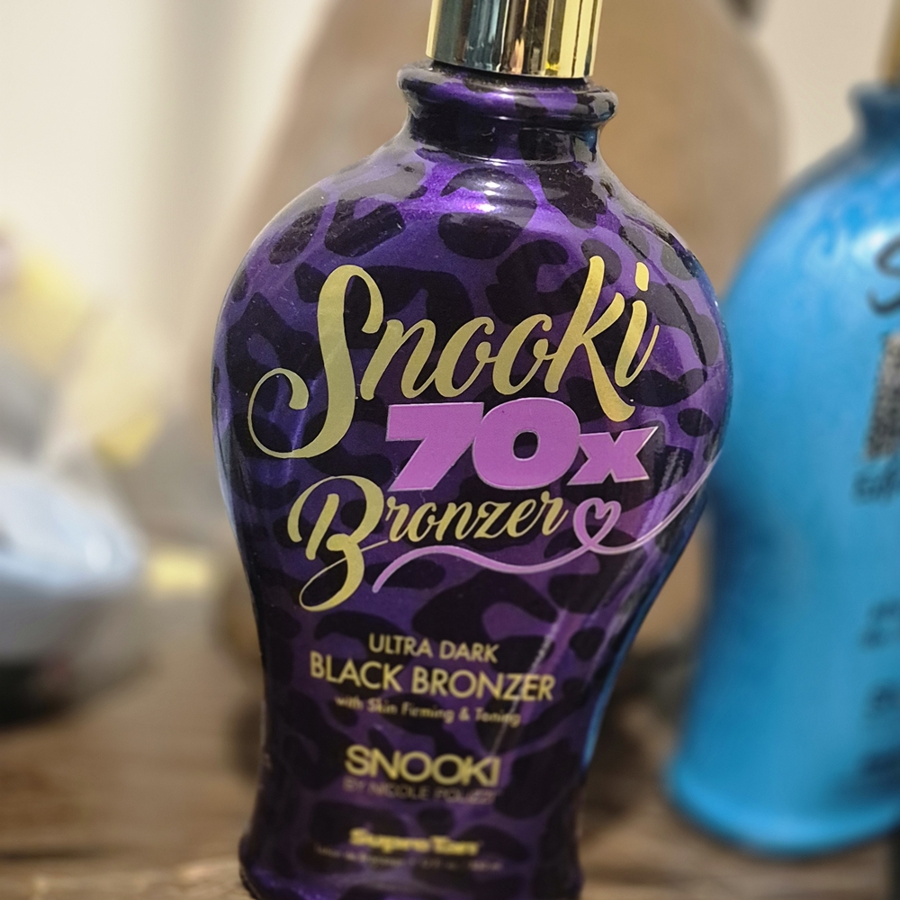 NEW!! Ultra Dark Black Bronzer - Purple